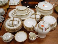 Lot 122 - A Mintons eight place setting dinner service...