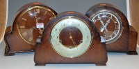 Lot 147 - A 1950s Enfield oak cased mantel clock;...