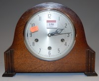 Lot 150 - A 1950s Smiths oak cased mantel clock, having...