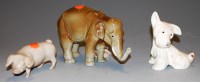 Lot 172 - A Royal Dux porcelain elephant, together with...
