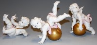 Lot 215 - Three Algora porcelain cherub figures, each in...