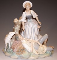 Lot 220 - A Lladro porcelain group of a snoozing...
