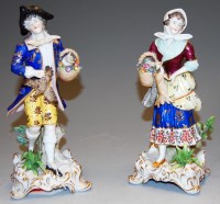 Lot 221 - A pair of Continental porcelain figures of a...