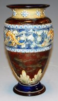 Lot 224 - A Doulton stoneware vase, of baluster form,...