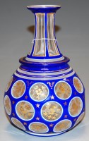 Lot 225 - A late 19th century Bohemian overlay decanter,...
