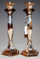 Lot 232 - A pair of silver candlesticks by William Adams...