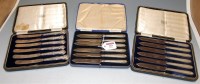 Lot 249 - Three cased sets of six silver handled butter...