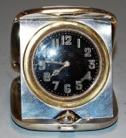 Lot 286 - A mid 20th century silver cased travel alarm...