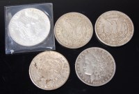 Lot 2063 - USA, four silver Morgan dollars, to include;...