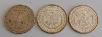 Lot 2097 - USA, three silver Morgan dollars, 1880...