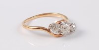Lot 2505 - A three stone diamond ring, the three...