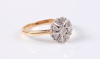 Lot 2506 - An 18ct diamond cluster ring, the central...