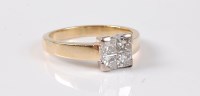 Lot 2507 - An 18ct four stone diamond ring, the four...
