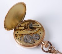 Lot 2532 - A '14k' pocket watch and '9c' chain, the white...