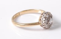 Lot 2537 - An 18ct diamond cluster ring, the central...