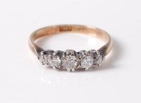Lot 2540 - An 18ct five stone diamond ring, the five...