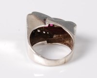Lot 2543 - A mid 20th century Odeonesque ring, the...