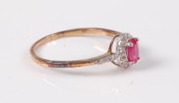 Lot 2544 - A treated ruby and diamond ring, the oval...