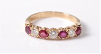Lot 2545 - An 18ct ruby and diamond ring, the seven...