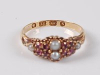 Lot 2546 - An 18ct Victorian ruby and pearl ring, the two...