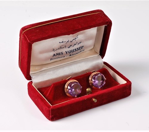 Lot 2550 - A pair of synthetic sapphire cufflinks, the...