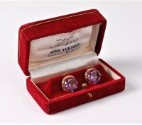 Lot 2550 - A pair of synthetic sapphire cufflinks, the...
