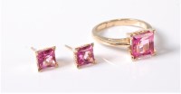 Lot 2551 - A pink topaz ring and matching earstuds, the...