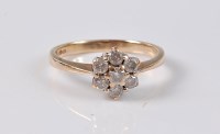 Lot 2563 - A 9ct diamond cluster ring, comprised of seven...