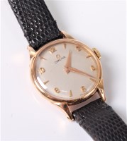 Lot 2571 - A lady's 18ct Omega wristwatch, the round...