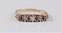 Lot 2574 - An 18ct five stone diamond ring, the five...