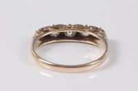 Lot 2574 - An 18ct five stone diamond ring, the five...