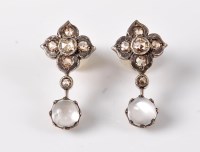 Lot 2578 - A pair of diamond and moonstone earrings, the...
