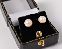 Lot 2579 - A pair of cultured pearl and diamond earstuds,...