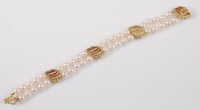 Lot 2583 - An '18k' cultured pearl and diamond bracelet,...