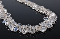 Lot 2585 - A moonstone necklace, the graduated multi...