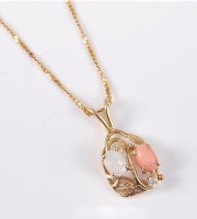Lot 2589 - An opal, coral and diamond necklace, the oval...