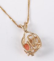 Lot 2589 - An opal, coral and diamond necklace, the oval...