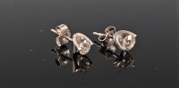 Lot 2594 - A pair of diamond earstuds, the round...