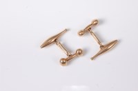 Lot 2601 - A pair of '9ct' cufflinks, the dumbbell and...