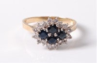 Lot 2607 - An 18ct sapphire and diamond cluster ring, the...