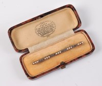 Lot 2616 - A 15ct sapphire and pearl bar brooch,...