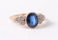 Lot 2617 - An 18ct synthetic sapphire and diamond ring,...