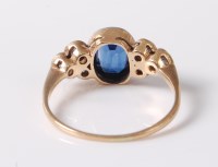 Lot 2617 - An 18ct synthetic sapphire and diamond ring,...