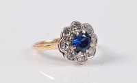 Lot 2618 - A synthetic sapphire and diamond ring, the...