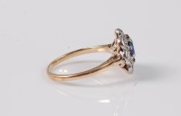 Lot 2618 - A synthetic sapphire and diamond ring, the...