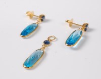 Lot 2622 - A pair of topaz and sapphire earrings, the...