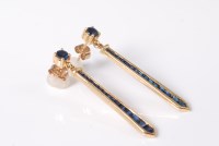 Lot 2623 - A pair of 18ct sapphire earrings, the...