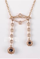 Lot 2639 - A sapphire negligee necklace, the oval blue...