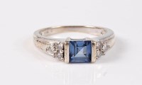 Lot 2640 - A synthetic sapphire and diamond ring, the...