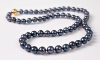 Lot 2651 - A cultured Tahitian pearl necklace, the...